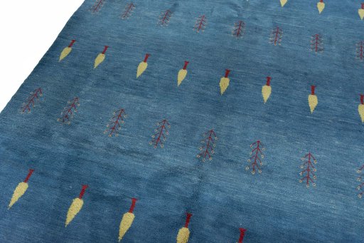 Backside of handmade New Persian Gabbeh rug showing knot structure and weave density