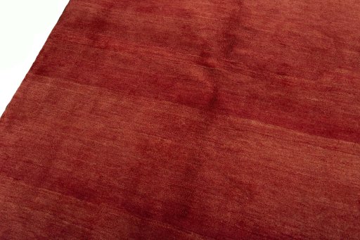 Backside of handmade New Persian Gabbeh rug showing knot structure and weave density