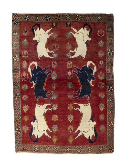 Full view of 2000s Persian Gabbeh rug from Iran / Persia, 180 × 130 cm in Red tones