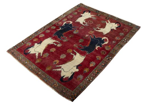 Corner detail of 2000s Persian Gabbeh rug showing border pattern and Wool pile