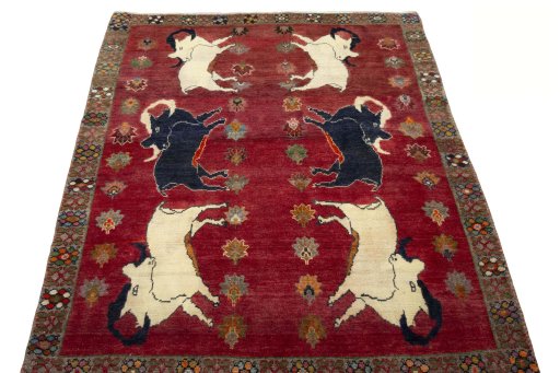 Surface texture of 2000s Persian Gabbeh rug with natural Wool and intricate pattern