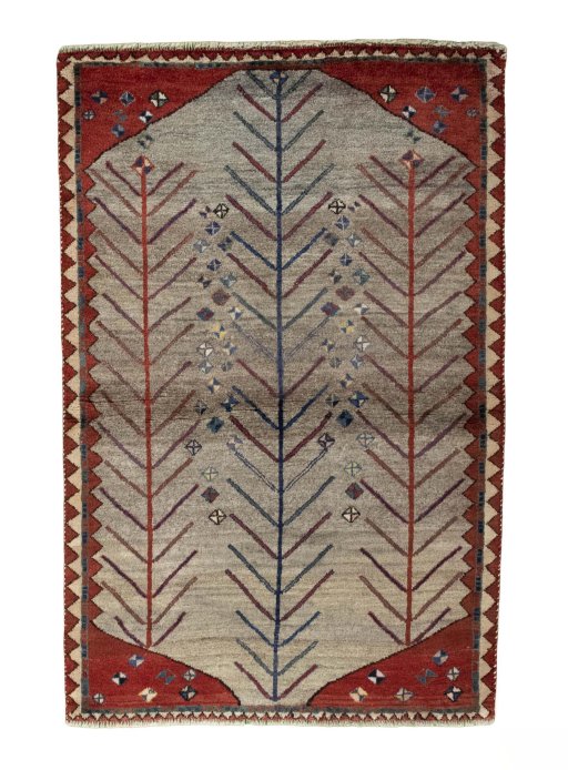 Full view of 2000s Persian Gabbeh rug from Iran / Persia, 150 × 100 cm in Beige tones