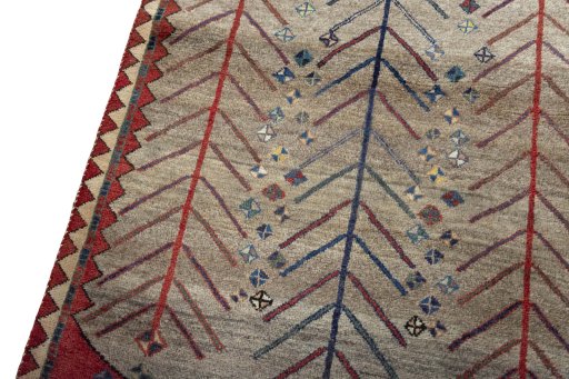 Backside of handmade 2000s Persian Gabbeh rug showing knot structure and weave density