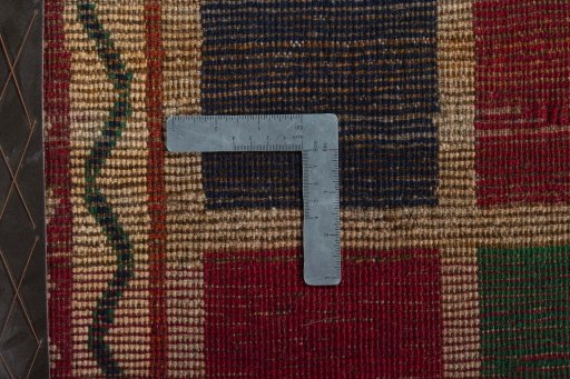 Close-up detail of 2000s Persian Gabbeh rug from Iran / Persia showing Wool weave