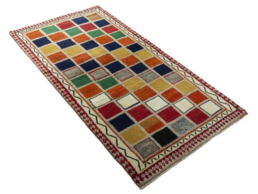 Close-up detail of 2000s Persian Gabbeh rug from Iran / Persia showing Wool weave