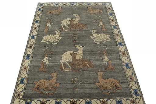 Surface texture of 2000s Persian Gabbeh rug with natural Wool and intricate pattern
