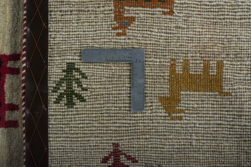 Close-up detail of 2000s Persian Gabbeh rug from Iran / Persia showing Wool weave