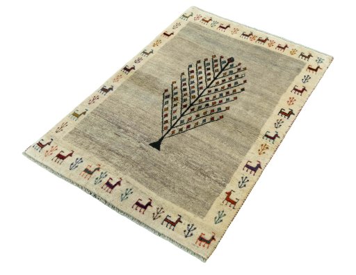 Corner detail of 2000s Persian Gabbeh rug showing border pattern and Wool pile