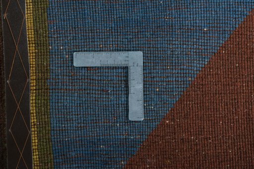 Close-up detail of 2000s Persian Gabbeh rug from Iran / Persia showing Wool weave