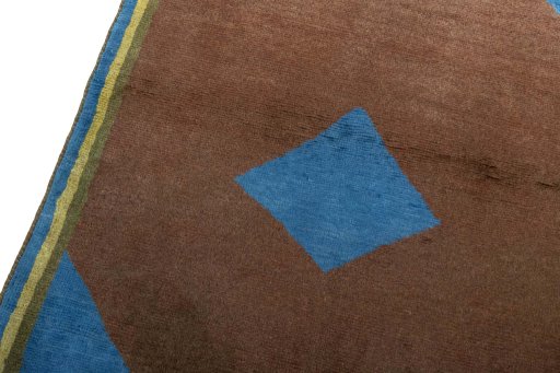 Backside of handmade 2000s Persian Gabbeh rug showing knot structure and weave density