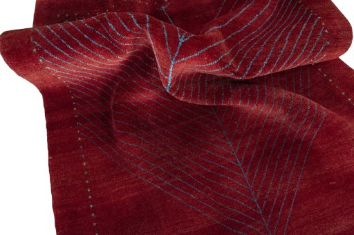 Corner detail of New Persian Gabbeh rug showing border pattern and Wool pile