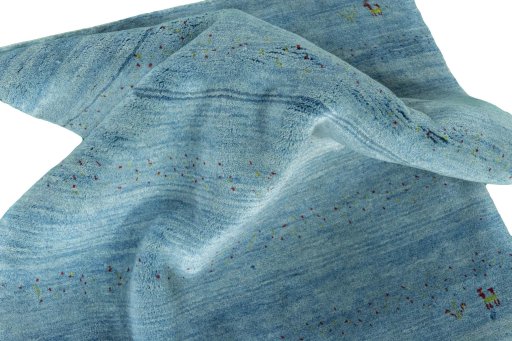 Corner detail of New Persian Gabbeh rug showing border pattern and Wool pile