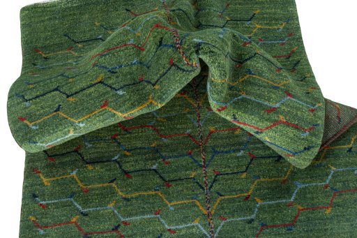 Corner detail of New Persian Gabbeh rug showing border pattern and Wool pile