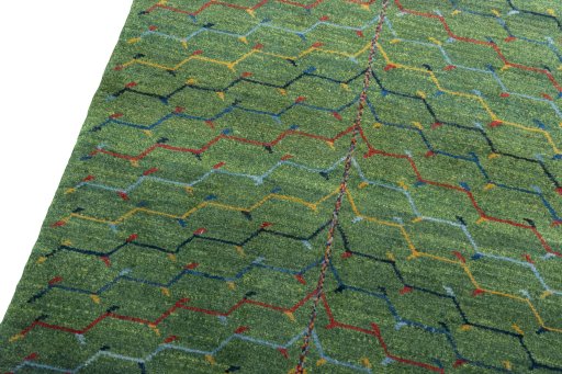 Backside of handmade New Persian Gabbeh rug showing knot structure and weave density