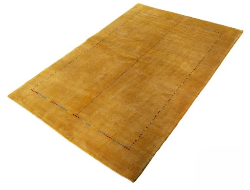 Corner detail of New Persian Gabbeh rug showing border pattern and Wool pile