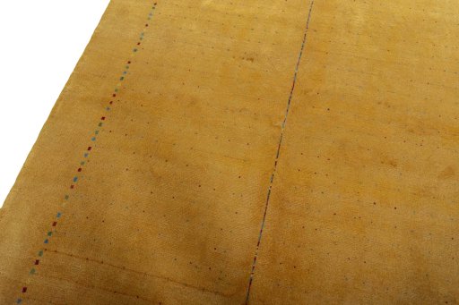 Backside of handmade New Persian Gabbeh rug showing knot structure and weave density
