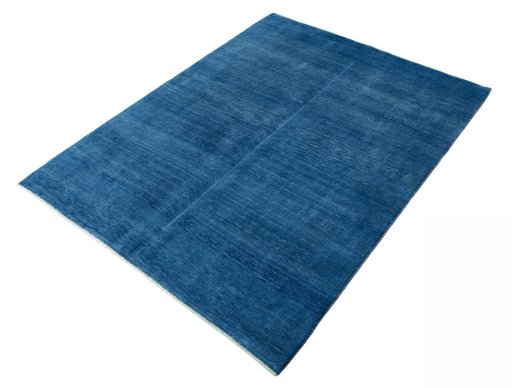 Corner detail of New Persian Gabbeh rug showing border pattern and Wool pile