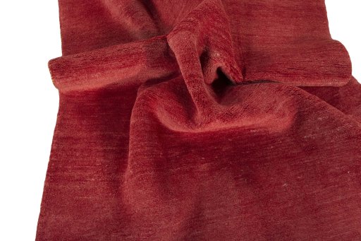 Corner detail of New Persian Gabbeh rug showing border pattern and Wool pile