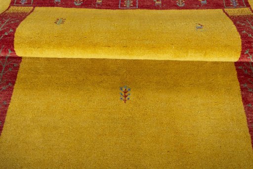 Full view of New Persian Gabbeh rug from Iran / Persia, 210 × 150 cm in Yellow tones