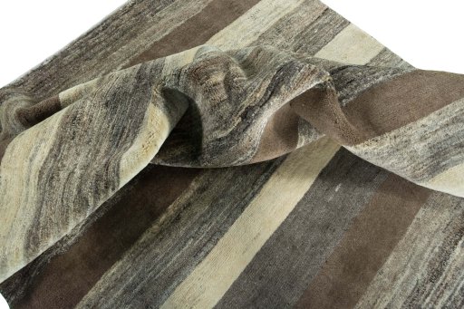 Corner detail of New Persian Gabbeh rug showing border pattern and Wool pile