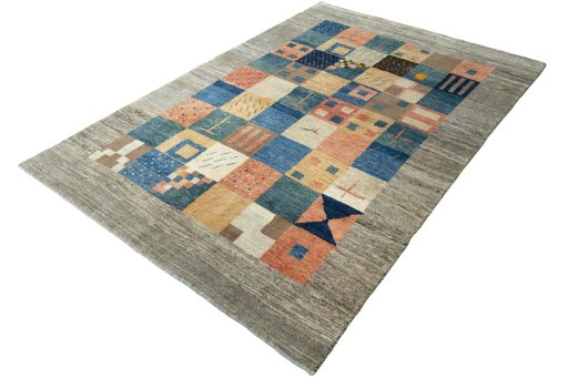 Corner detail of New Persian Gabbeh rug showing border pattern and Wool pile