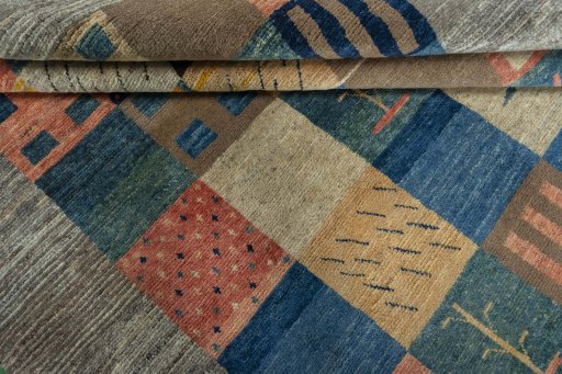 Full view of New Persian Gabbeh rug from Iran / Persia, 295 × 202 cm in Multi Color tones