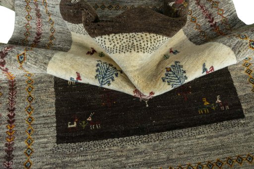Corner detail of New Persian Gabbeh rug showing border pattern and Wool pile