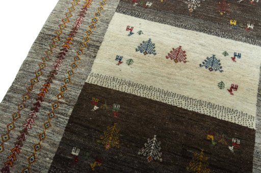 Backside of handmade New Persian Gabbeh rug showing knot structure and weave density
