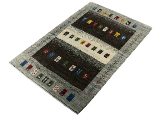 Corner detail of New Persian Gabbeh rug showing border pattern and Wool pile