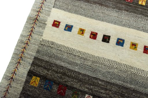 Backside of handmade New Persian Gabbeh rug showing knot structure and weave density