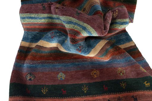 Corner detail of New Persian Gabbeh rug showing border pattern and Wool pile