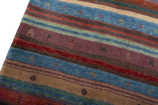 Backside of handmade New Persian Gabbeh rug showing knot structure and weave density