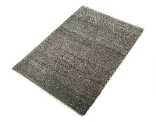 Corner detail of New Persian Gabbeh rug showing border pattern and Wool pile
