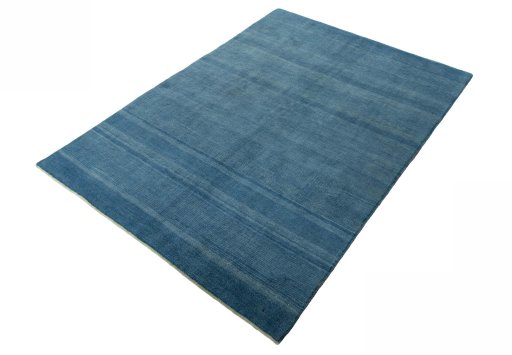 Corner detail of New Persian Gabbeh rug showing border pattern and Wool pile