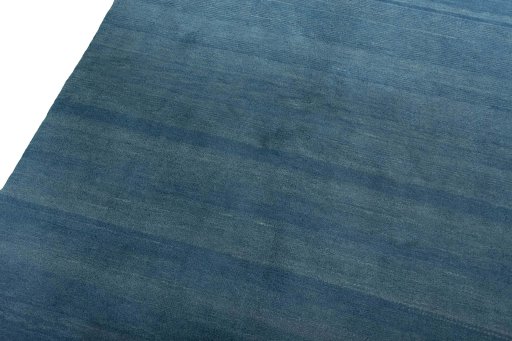 Backside of handmade New Persian Gabbeh rug showing knot structure and weave density