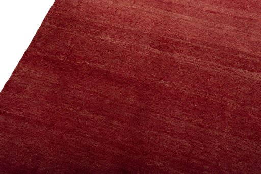 Backside of handmade New Persian Gabbeh rug showing knot structure and weave density