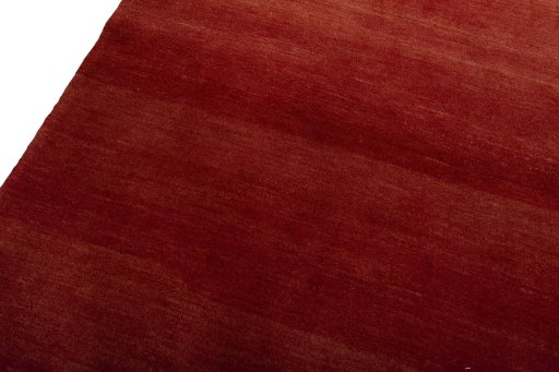 Backside of handmade New Persian Gabbeh rug showing knot structure and weave density
