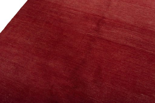 Backside of handmade New Persian Gabbeh rug showing knot structure and weave density