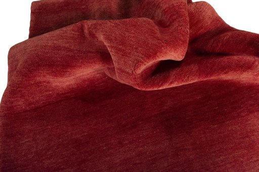 Corner detail of New Persian Gabbeh rug showing border pattern and Wool pile