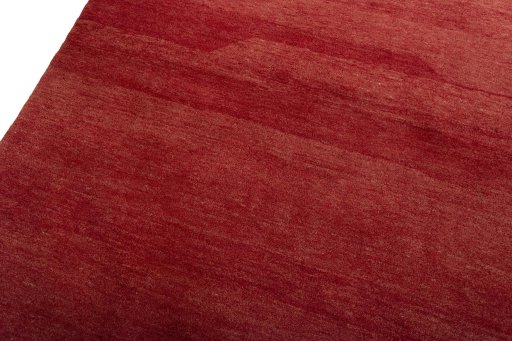 Backside of handmade New Persian Gabbeh rug showing knot structure and weave density