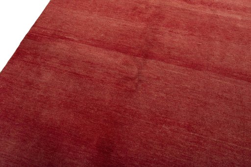 Backside of handmade New Persian Gabbeh rug showing knot structure and weave density
