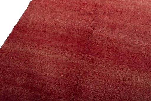 Backside of handmade New Persian Gabbeh rug showing knot structure and weave density