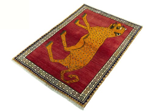 Corner detail of 2000s Persian Gabbeh rug showing border pattern and Wool pile