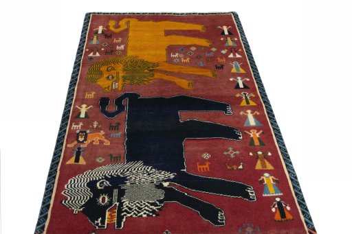 Surface texture of 2000s Persian Gabbeh rug with natural Wool and intricate pattern