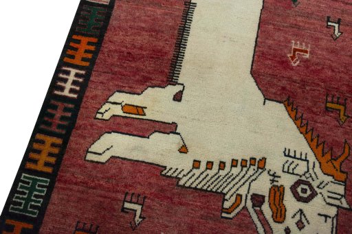 Backside of handmade 2000s Persian Gabbeh rug showing knot structure and weave density