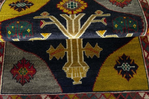 Full view of 2000s Persian Gabbeh rug from Iran / Persia, 140 × 107 cm in Blue tones