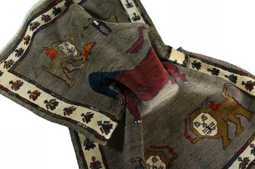 Corner detail of New Persian Gabbeh rug showing border pattern and Wool pile