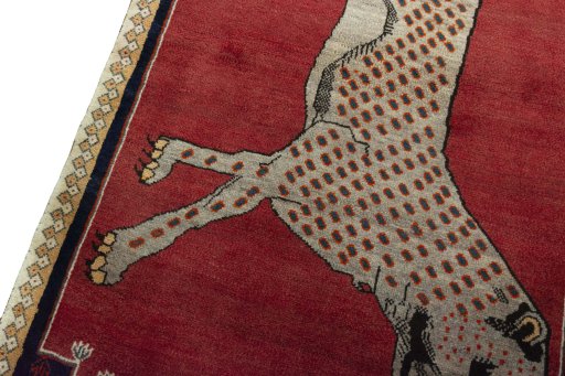 Backside of handmade 2000s Persian Gabbeh rug showing knot structure and weave density