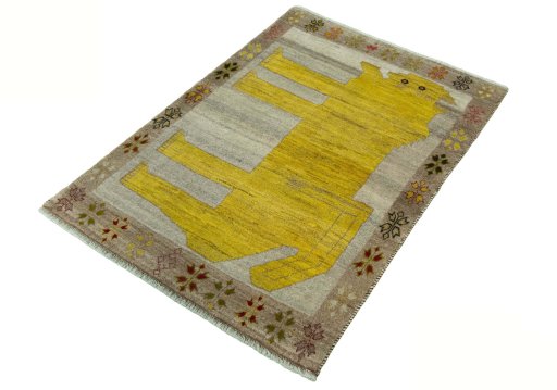 Corner detail of 2000s Persian Gabbeh rug showing border pattern and Wool pile