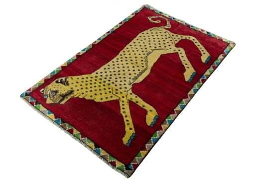 Corner detail of 2000s Persian Gabbeh rug showing border pattern and Wool pile